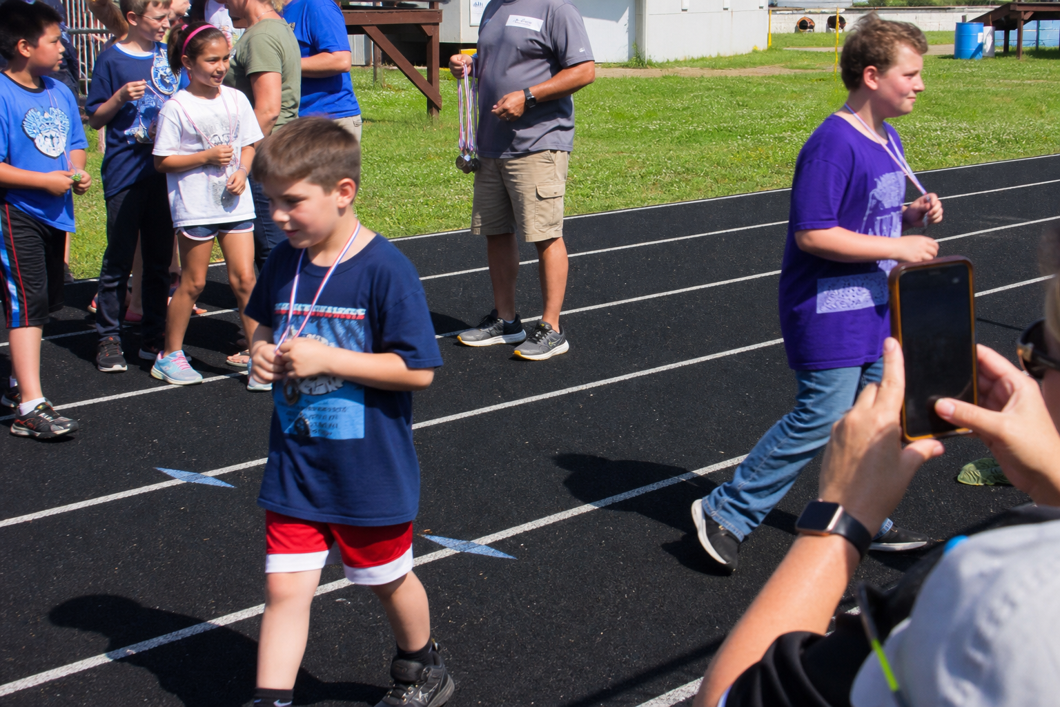 Track day with medals and families